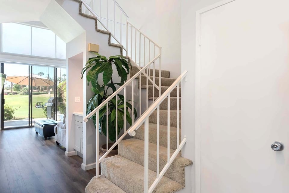Staircase to the all bedrooms upstairs.