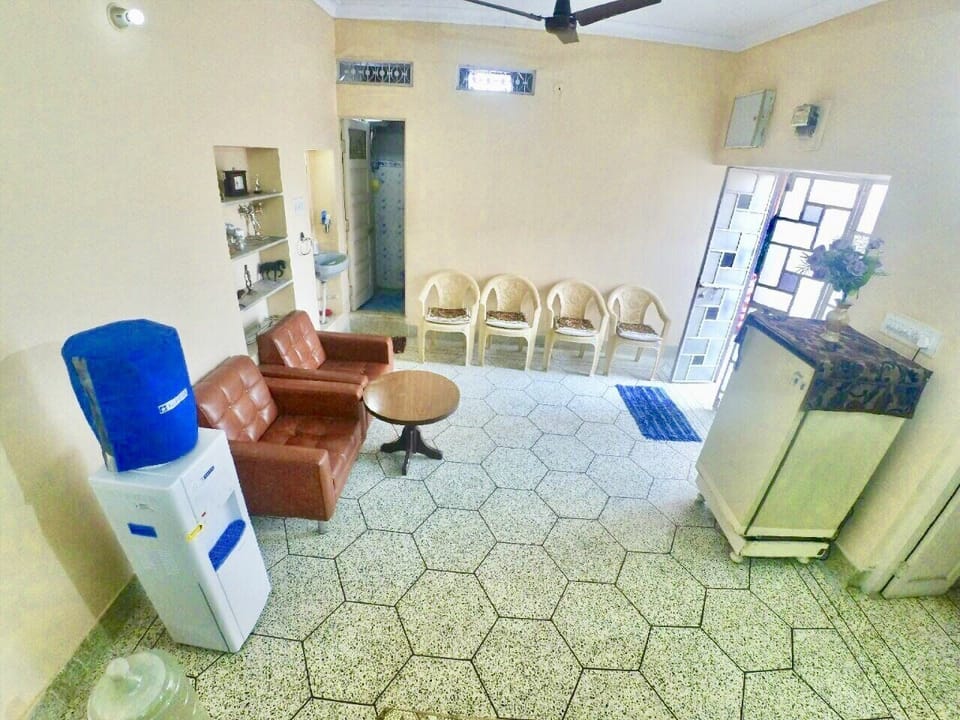 Living area:
1. Refrigerator
2. Water cooler
3. Couches
4. Dining Table