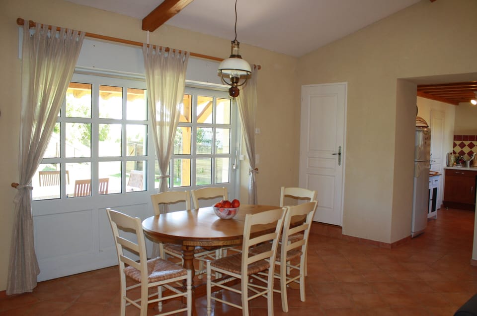 Indoor dining area. Doorway leads to pigeon tower