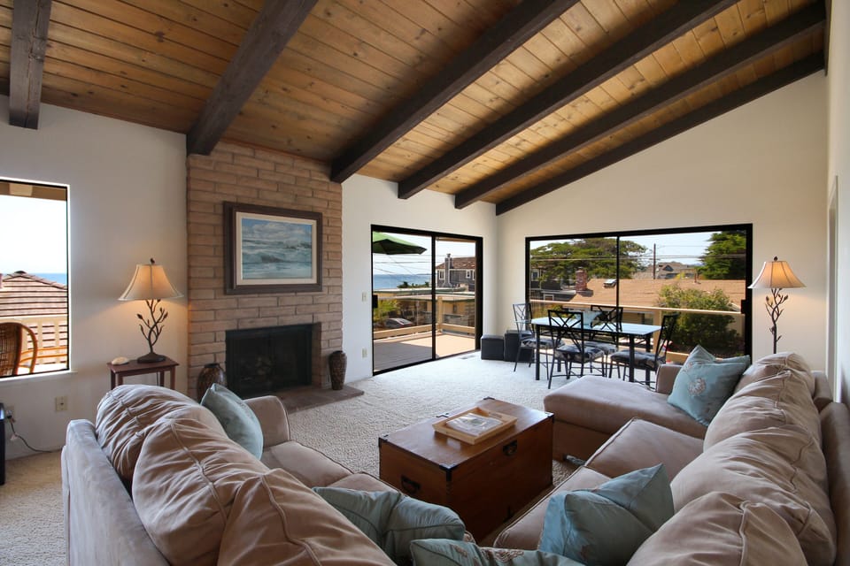 Large living room with ocean view dining.