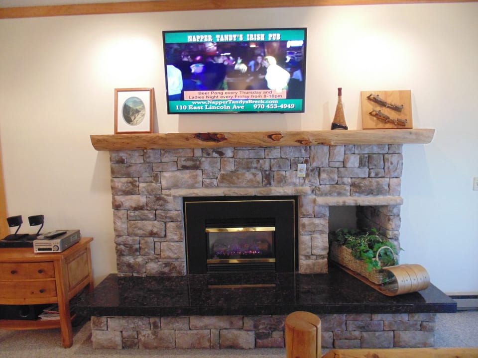 Room A: Gas fireplace with 50" Smart HDTV