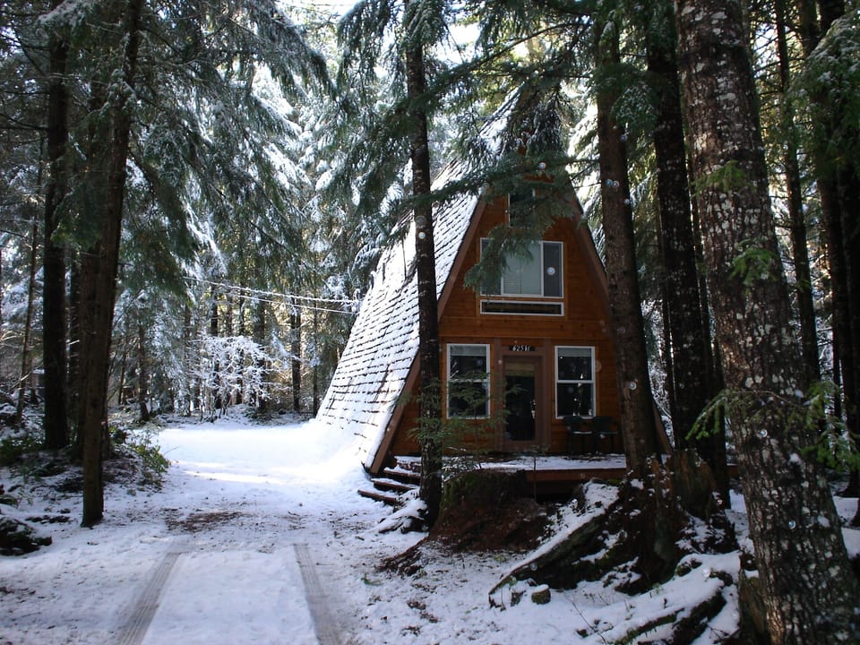 Located on wooded lot on cul-de-sac