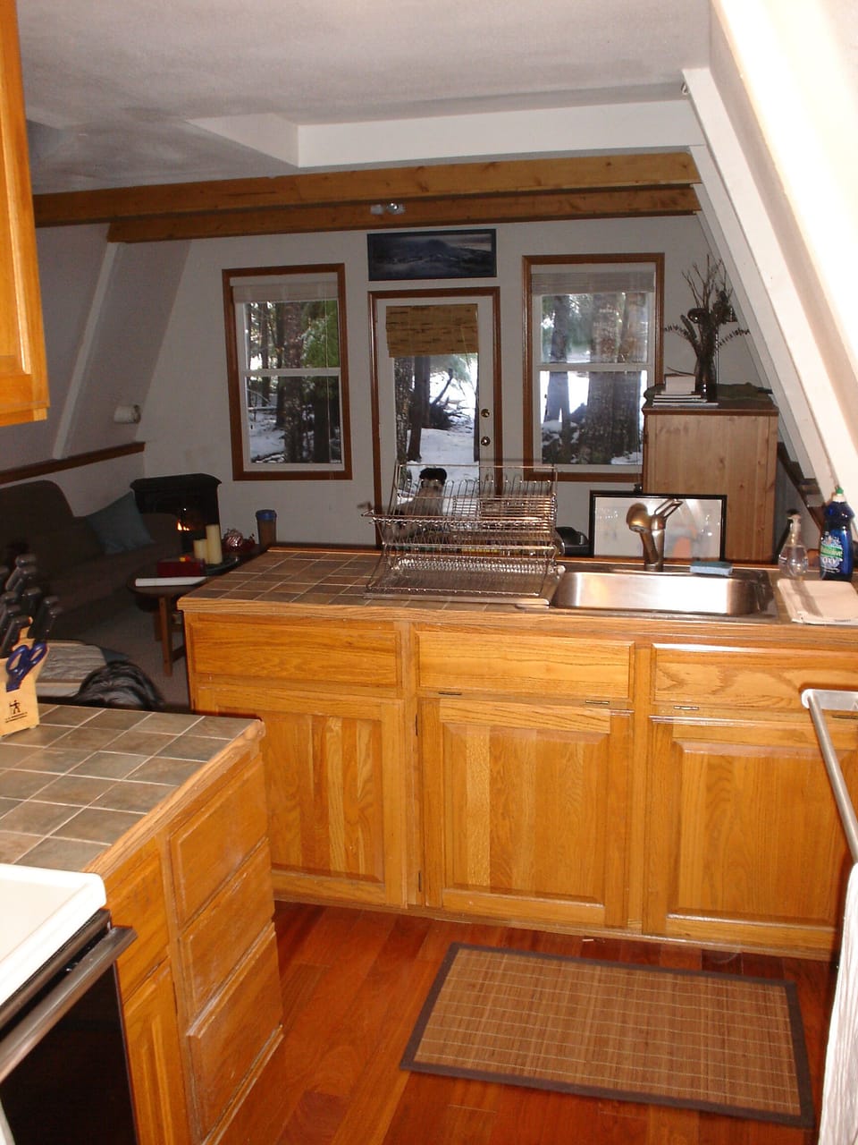 Kitchen opens to living and eating areas