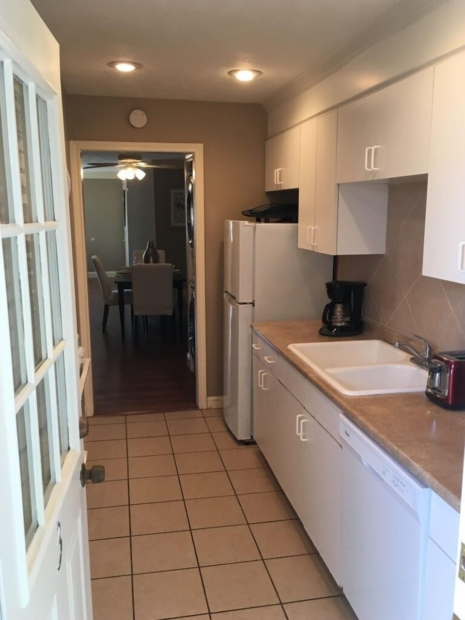 View of the kitchen from back door