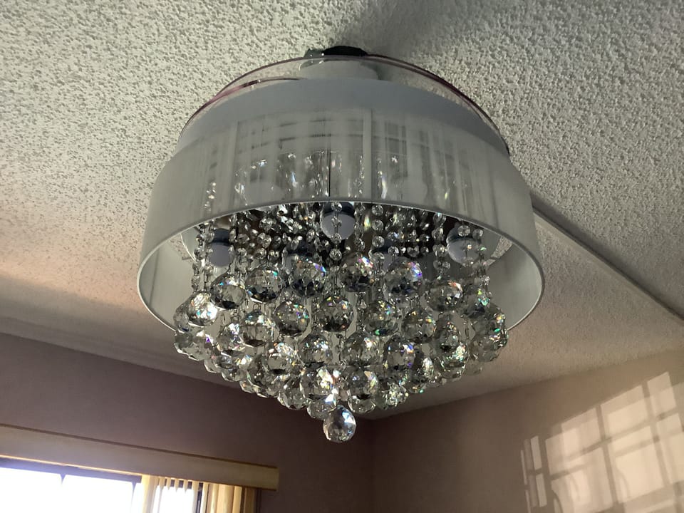 close up view of lovely fandelier with 61 crystal bead sets.