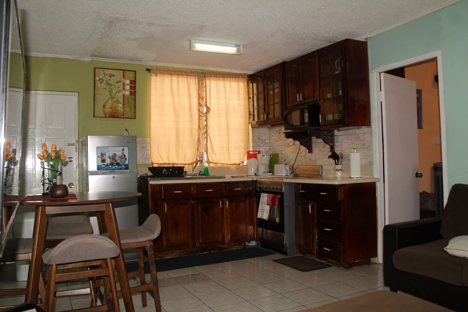 Fully-equipped kitchenette complete with microwave, coffee maker, toaster & more