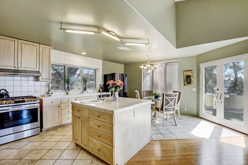 Open kitchen to living and dinning area and deck