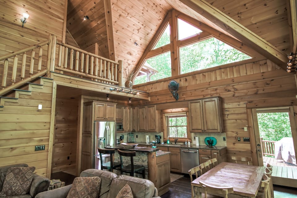 High Cathedral Ceilings & Huge Glass Panels Bring in a Bounty of Natural Light