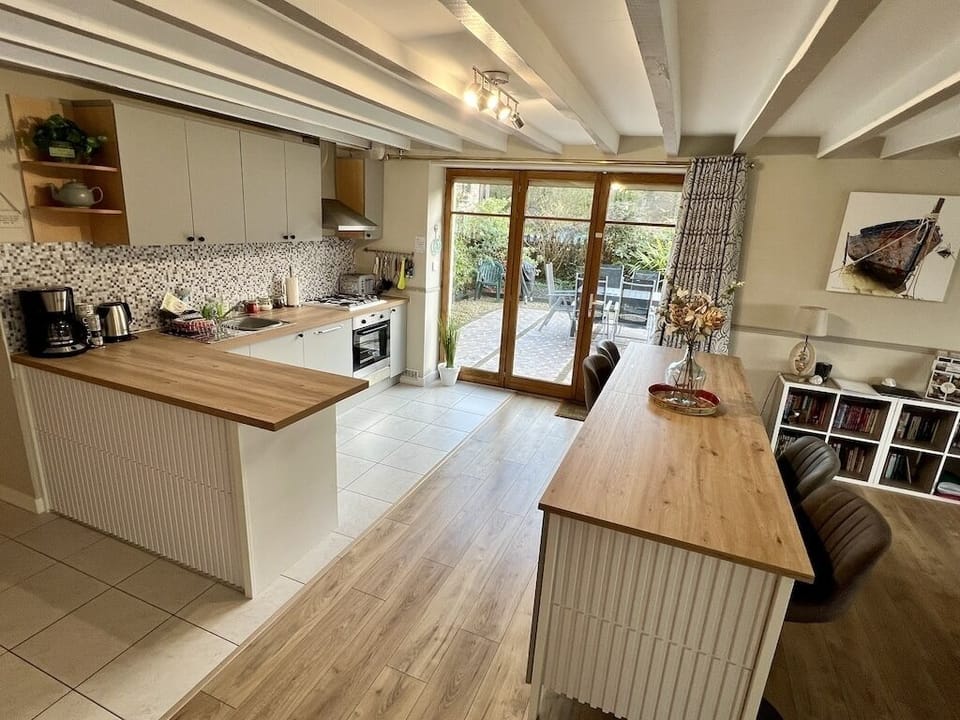 Enjoy our fully equipped kitchen and large breakfast/entertaining island