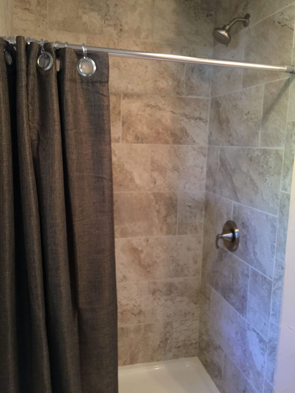 Brand new tile and shower fixtures !