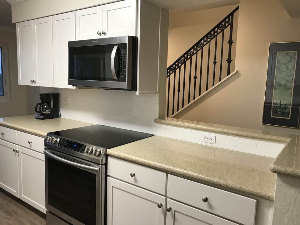 Kitchen facing entry stair