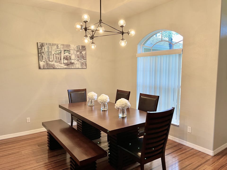 Separate dining room with plenty of space for everyone. 