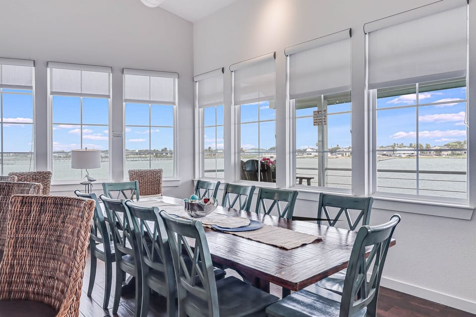 Open dining area that seats 10 with Little Bay water views.