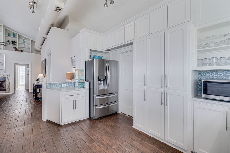 French Door Refrigerator with ice maker.  Additional Commercial Ice Maker in Garage.  