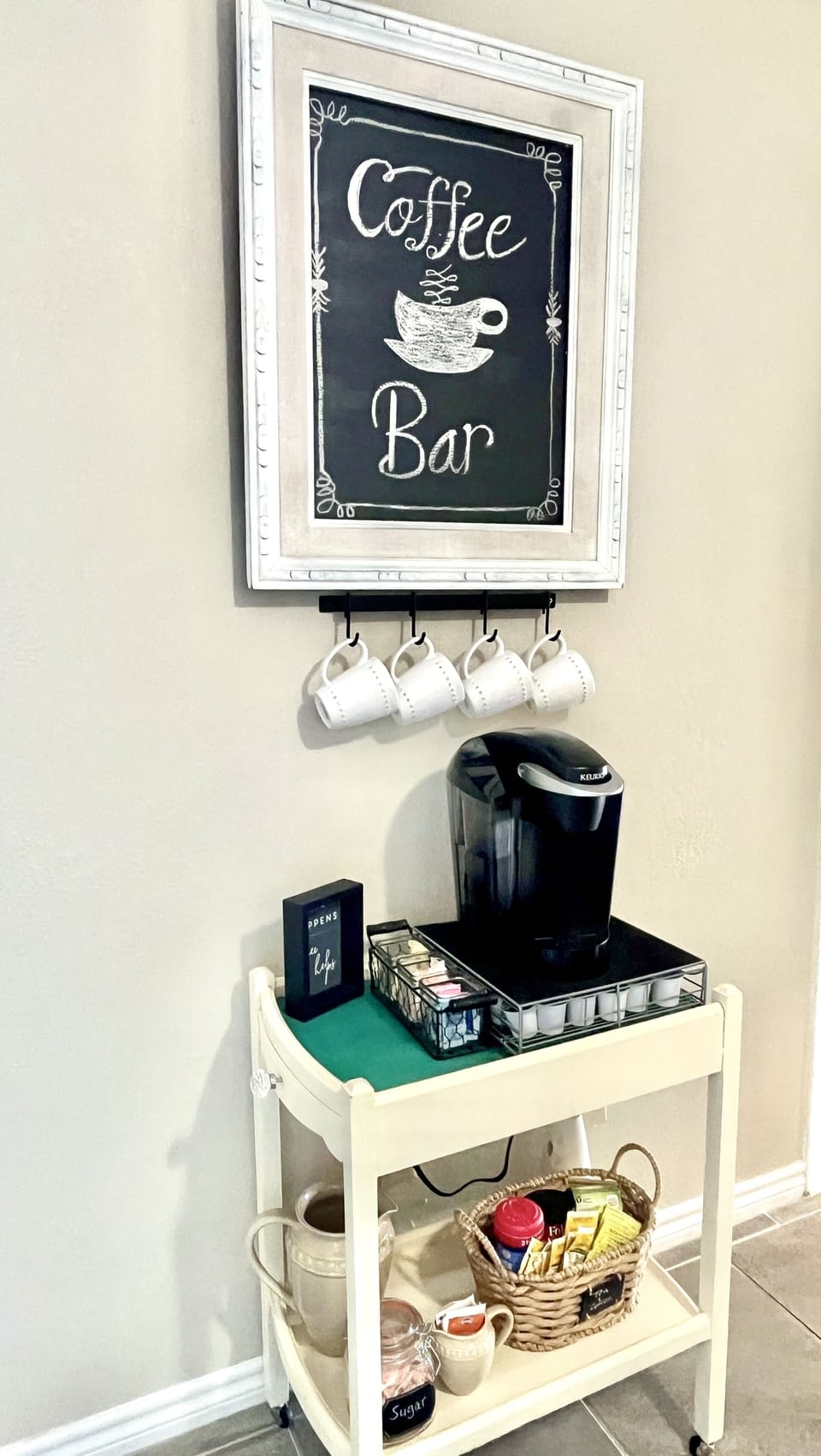 Coffee Bar equipped with Keurig, assortment of K-cups, tea, creamer and sugar