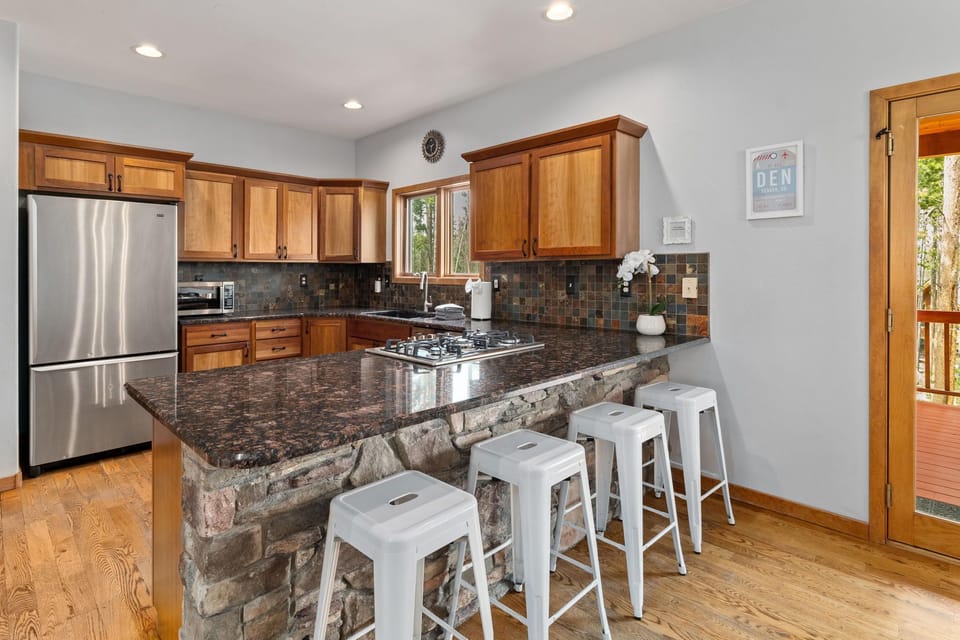 Kitchen with additional bar seating