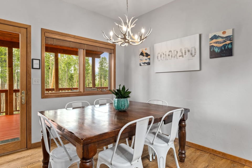 Dining table can be extended to fit 10 with bar seating in both kitchens for 8