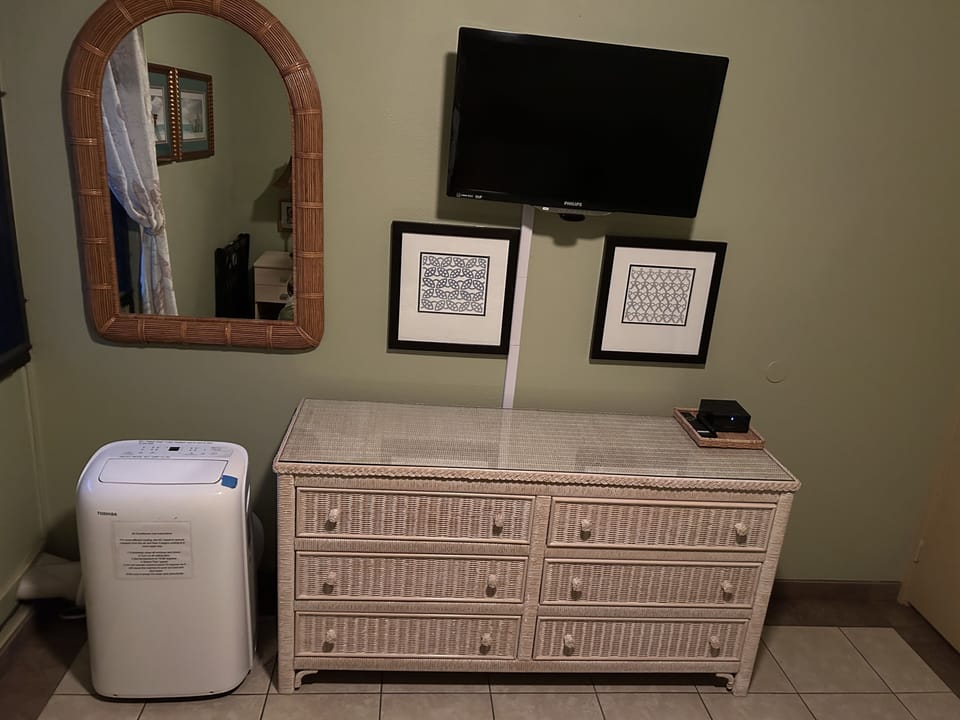 Plenty of storage in dresser, side table and closet. Luggage rack available. 