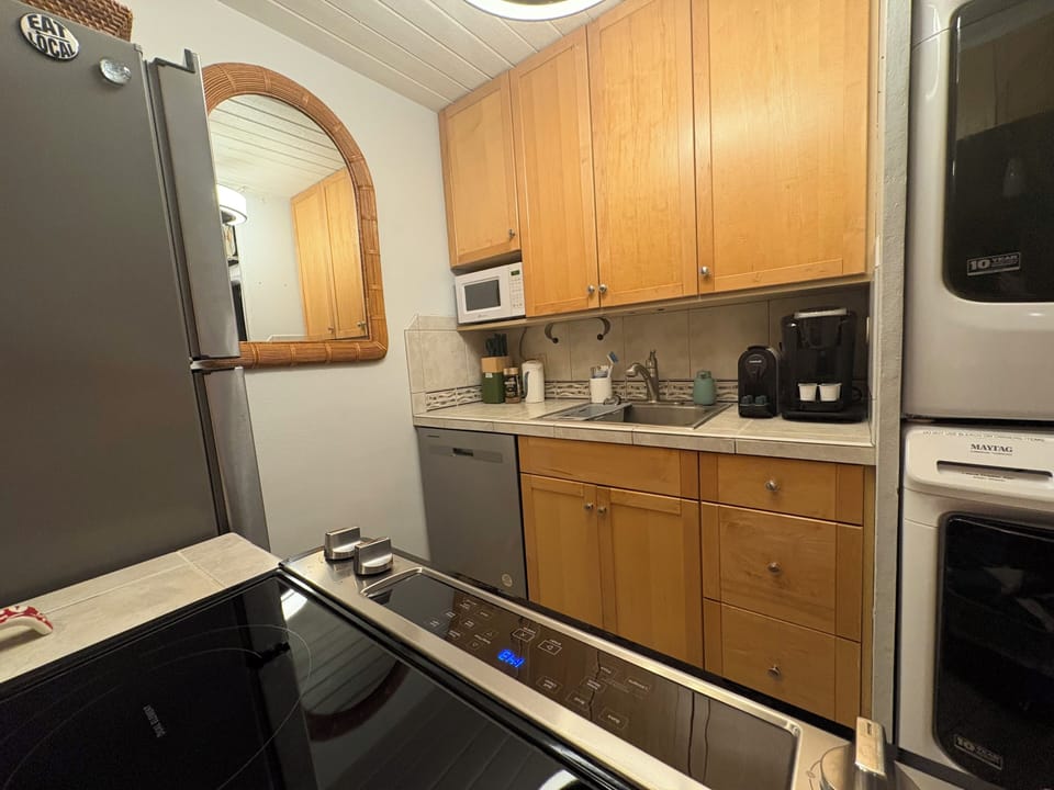 Kitchen. Full sized Maytag washer & Dryer. Detergent provided.