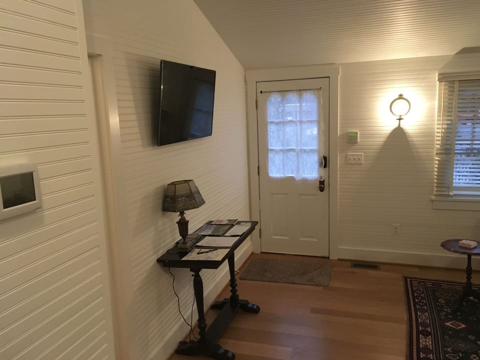 Front entrance with mounted TV