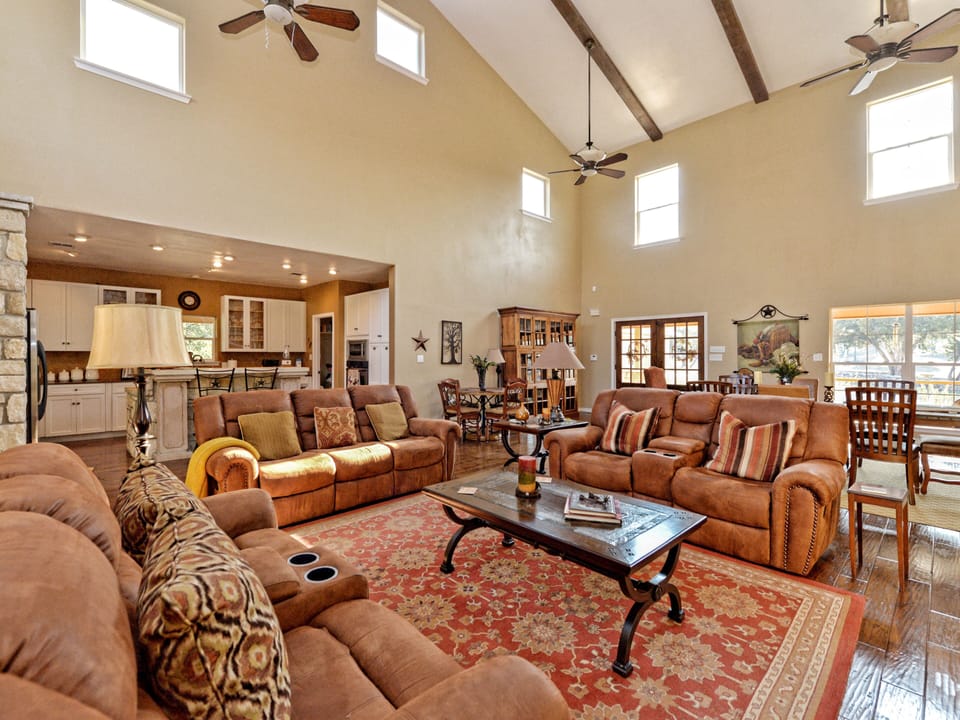 Another  view of living room, looking towards kitchen and dining area.  
