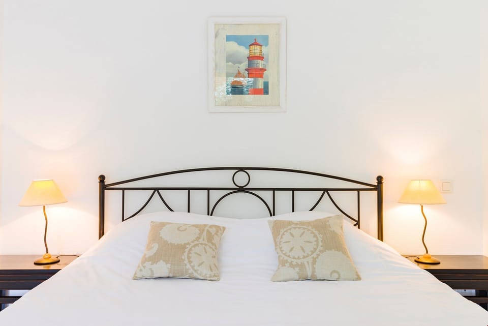 Drift to sleep in the comfortable bed after a wonderful day outside.