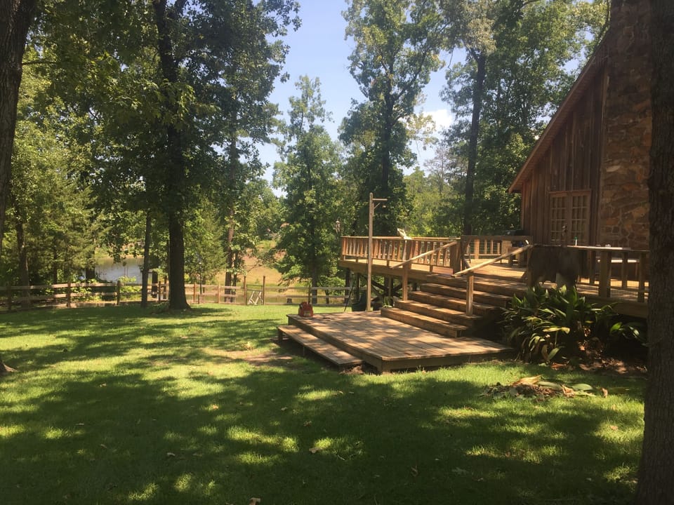 North view of lake and west side of house and deck
