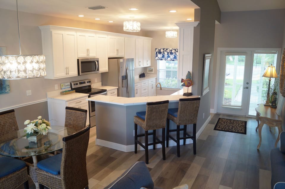Remodeled Kitchen - cupboards, countertops, lighting, floors
