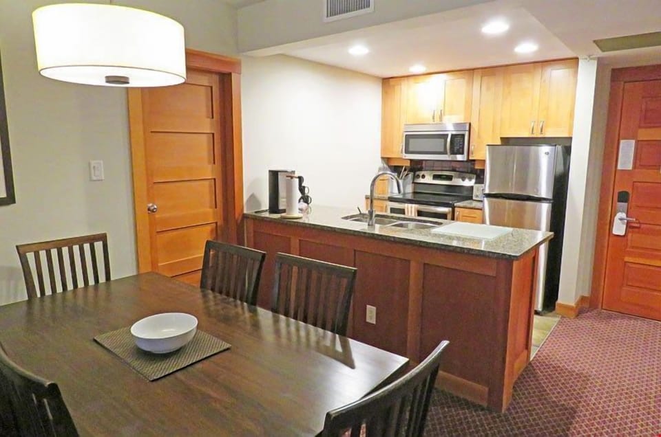 Enjoy meals or entertain at the dining room table.