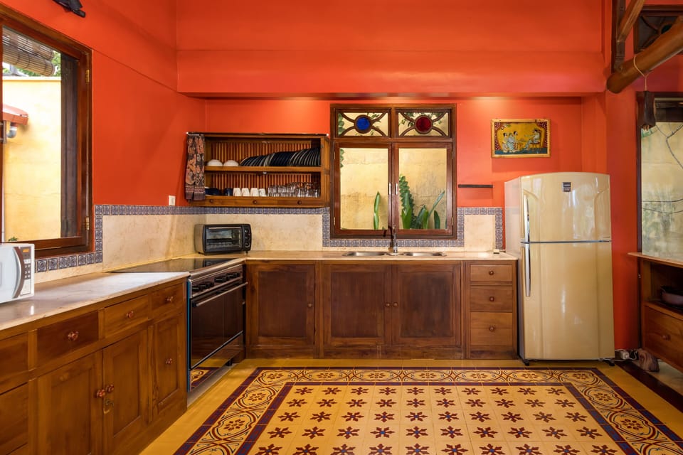 View of Kitchen with dish rack exposed.