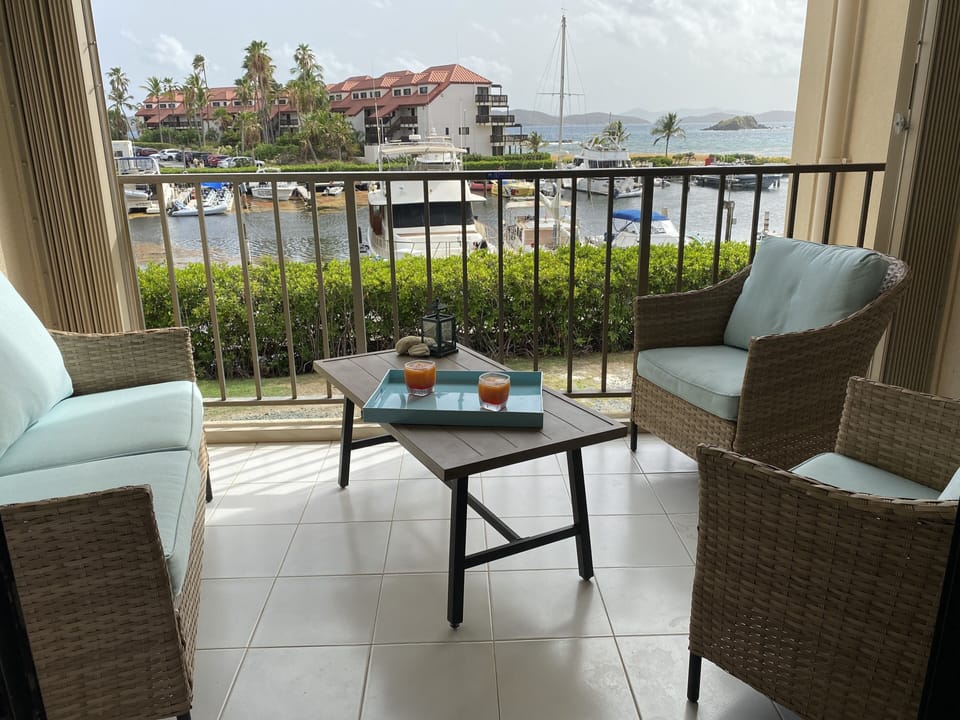 Balcony area with direct views of marina, St John’s, and BVIs. 