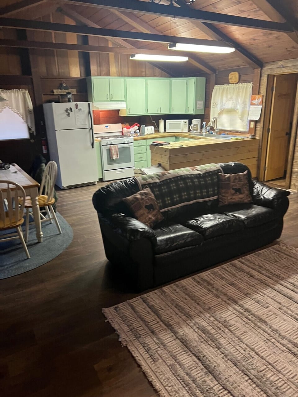 Kitchen/Dining, full size frig, stove, microwave, toaster, coffee maker