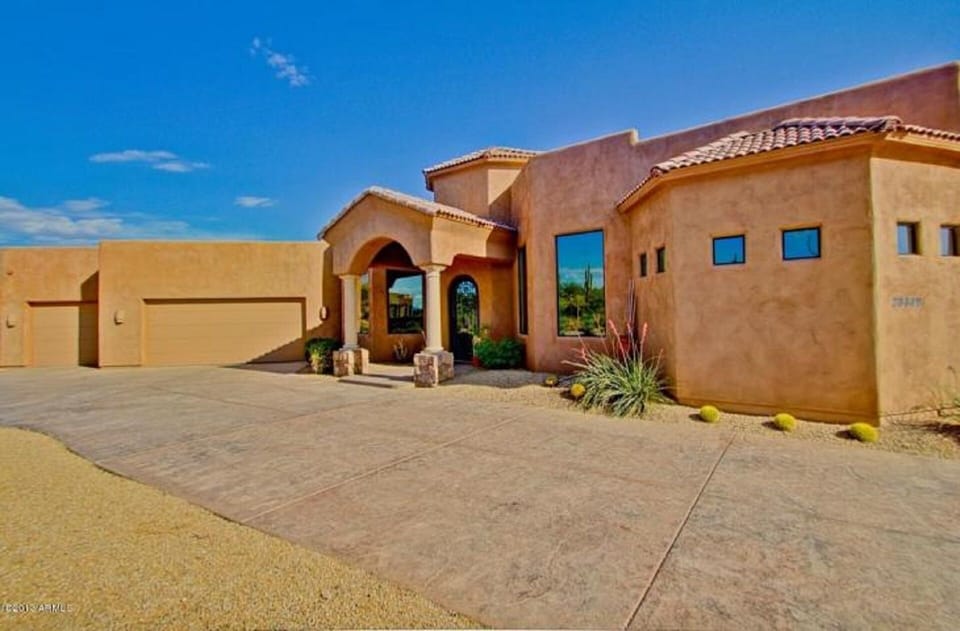 Front house elevation with 3 car garage.