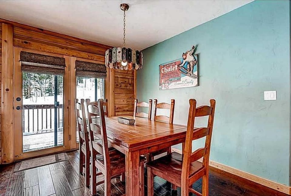 Dining table expands to accommodate 8-10 people (8 matching chairs).