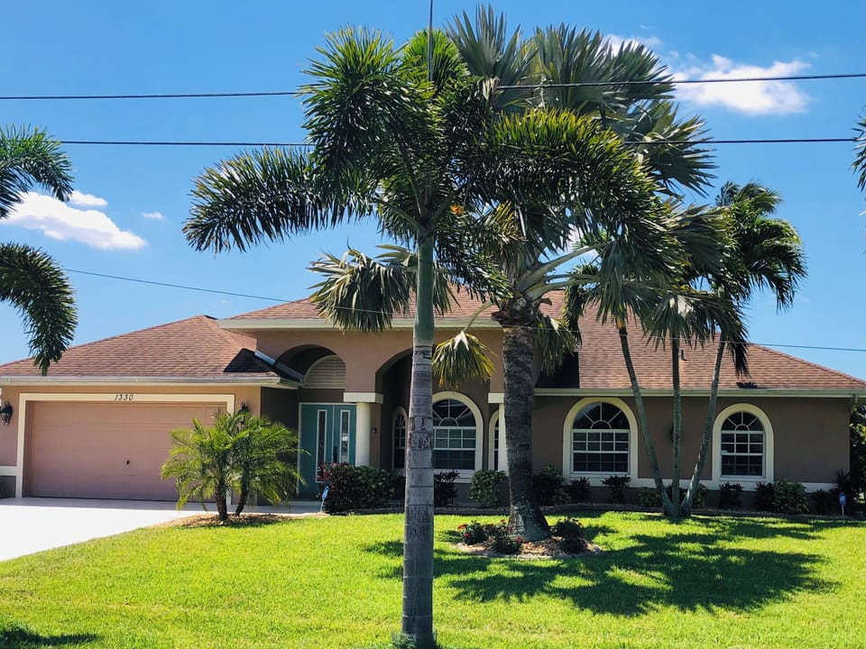 Your vacation home has curb appeal! Your tropical paradise awaits!