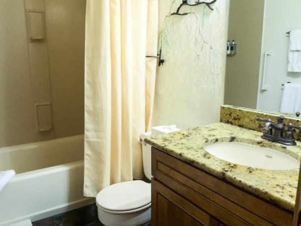 Get ready for the day ahead in the bright bathroom.