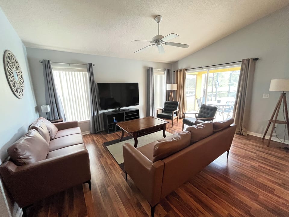 Family Room with smart TV - walkout to back/pool area