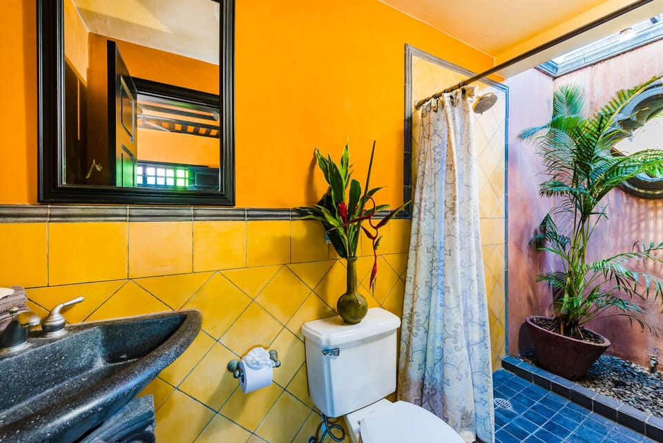 Coral bathroom with open air shower