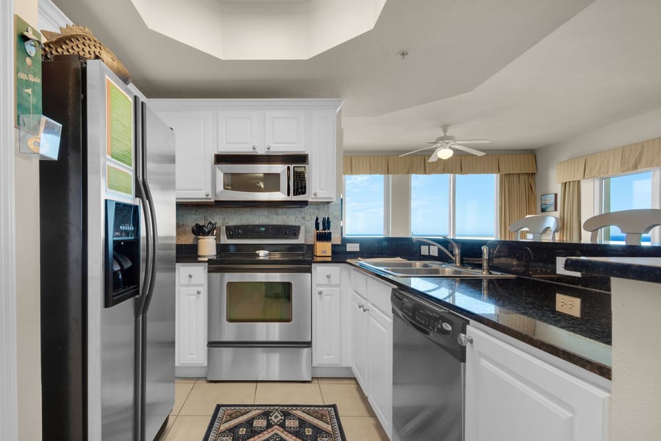 Fridge with ice & drink dispenser, oven, dishwasher, microwave, blender, toaster