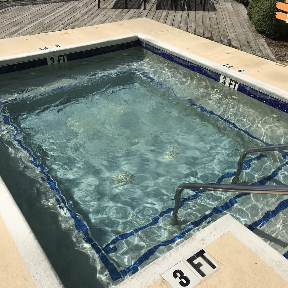 Hot tub at sand bottom pool