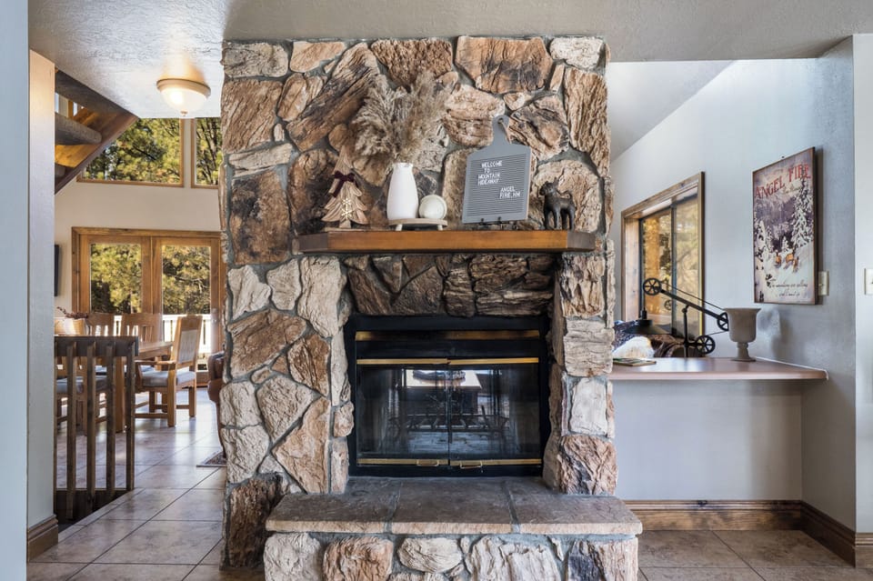 Light a fire in this fireplace and enjoy from the kitchen and living room alike