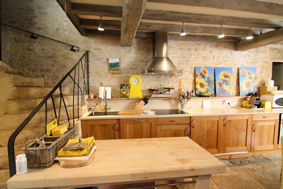 Kitchen has new undercounter appliances--dishwasher, fridge, freezer & oven.