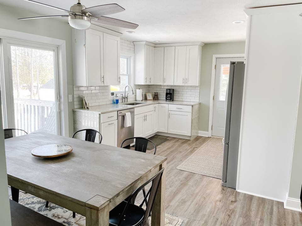 Kitchen with full dining table - 4 chairs and one dining bench
