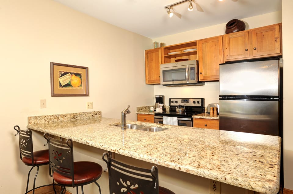 Enjoy cooking in the fully-equipped kitchen, complete with stainless steel appliances