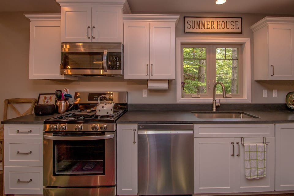 Stainless steel appliances throughout. 