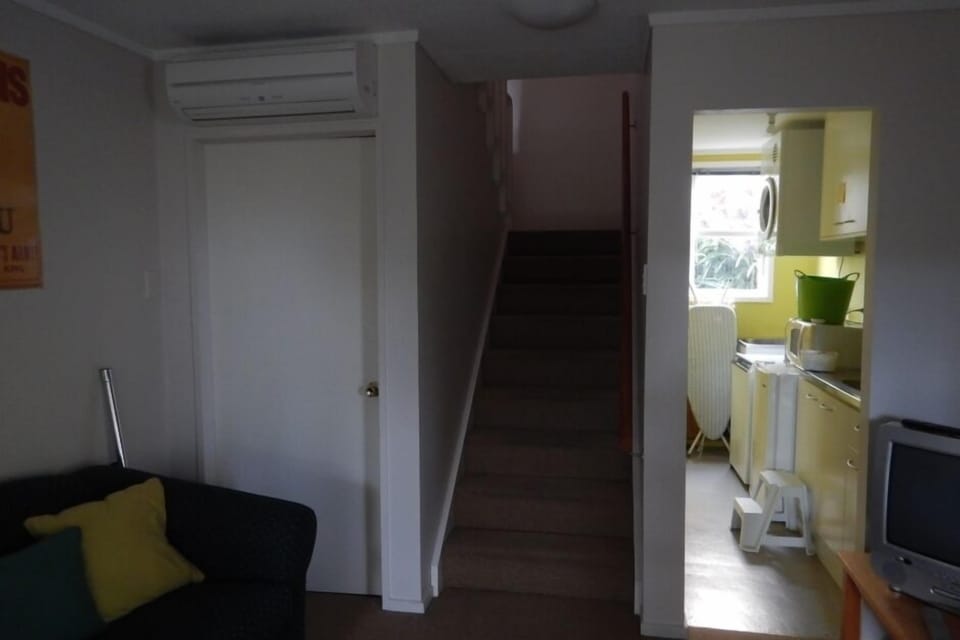 Kitchenette and stairs to main living area.