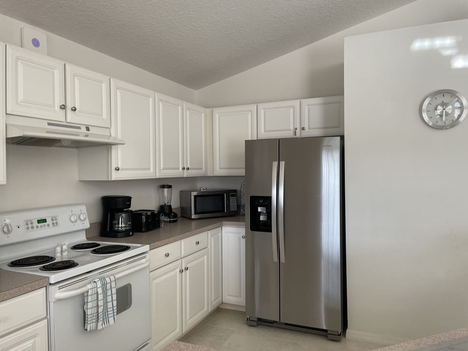 Newly added fridge/freezer with water and ice maker