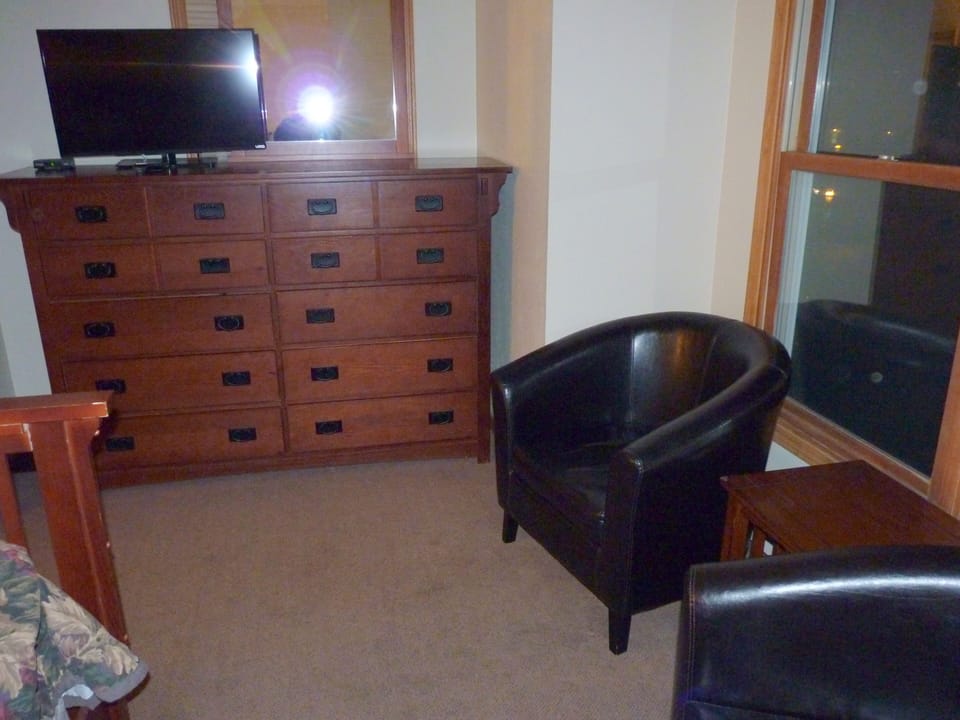 dresser and TV in master