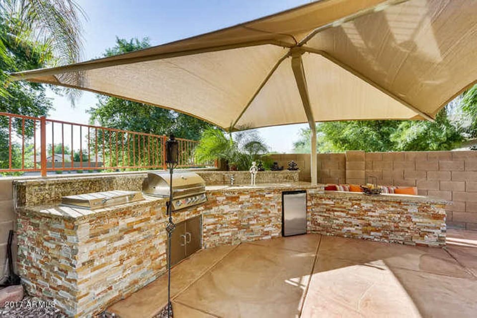 Outdoor BBQ and seating area 