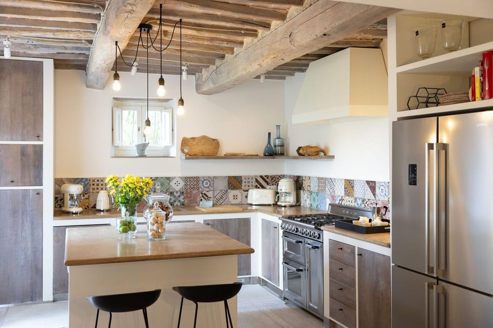 Furniture, Kitchen, Countertop, Interior Design, Kitchen Appliance, Cabinetry, Flooring, Wall, Major Appliance, Wood